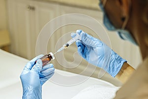 Procedure for filling the syringe with medicine before injecting Doctor.