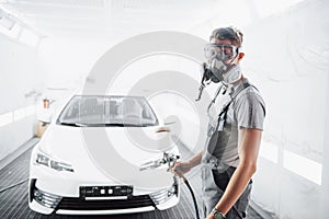 The procedure of painting a car in the service center.