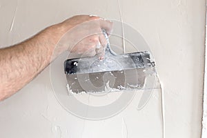 The process of applying the second layer of putty