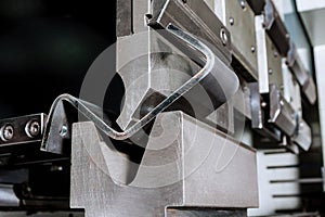 The process of bending sheet metal on a hydraulic bending machine