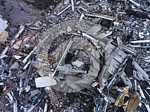 A process of buliding destruction, demolished house, shot from air with drone photo