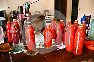 process of capping sauce bottles