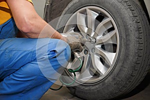 The process of changing tires on a car before the season