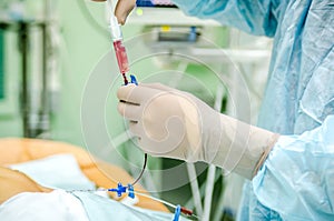 The process of checking the central venous catheter.