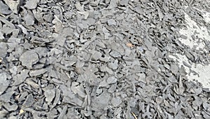 the process of cleaning coconut shell charcoal after burning, before drying