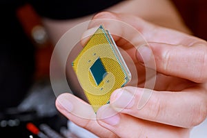 Process of connecting the CPU to the processor socket on a modern computer motherboard