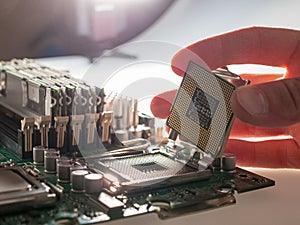 the process of connecting the CPU to the processor socket on a modern computer motherboard, replacing the silicon data processing