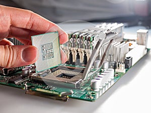 The process of connecting the CPU to the processor socket on a modern computer motherboard, replacing the silicon data processing