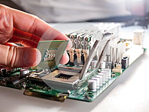 The process of connecting the CPU to the processor socket on a modern computer motherboard, replacing the silicon data processing