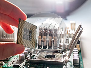 The process of connecting the CPU to the processor socket on a modern computer motherboard, replacing the silicon data processing