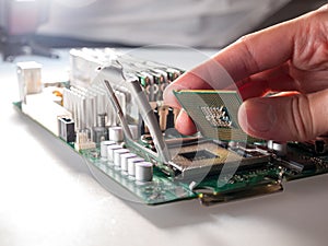 The process of connecting the CPU to the processor socket on a modern computer motherboard, replacing the silicon data processing