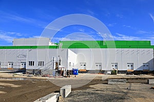 The process of construction and launch of a large logistics center, its internal filling and finishing