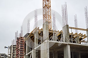 The process of construction and repair of a new modern cement concrete stone pannel monolithic frame-block building of a house