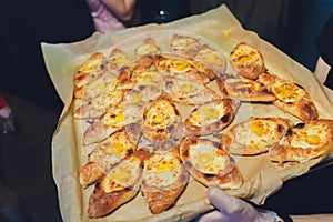 Process of cooking traditional adjarian georgian and armenian cuisine, hachapuri khachapuri with suluguni cheese and egg