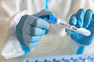 Process of coronavirus PCR antigen testing examination by nurse medic in laboratory lab, COVID-19 swab collection kit, test tube