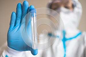 Process of coronavirus PCR antigen testing examination by nurse medic in laboratory lab, COVID-19 swab collection kit, test tube