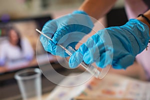 Process of coronavirus testing examination at home, COVID-19 swab collection kit, test tube for taking OP NP patient specimen