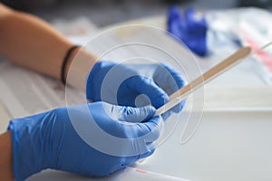 Process of coronavirus testing examination at home, COVID-19 swab collection kit, test tube for taking OP NP patient specimen