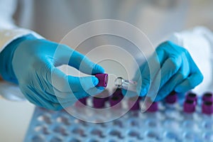 Process of coronavirus testing examination by nurse medic in laboratory lab, COVID-19 swab collection kit, test tube for taking OP