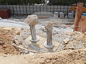 The process of cutting piles after the completion of building foundation piling work.