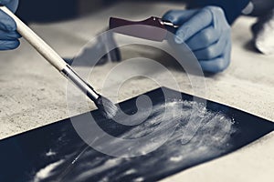 The process of detecting traces at the scene of the crime