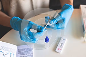 Process of express fast coronavirus covid Antigen AG PCR testing examination at home, COVID-19 swab collection kit, test tube for