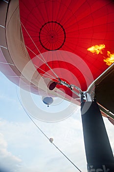 Process of filling air balloon with hot air and fire