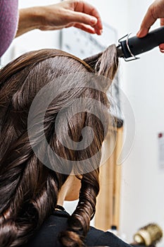 Process of frizzle while hair-dressing photo