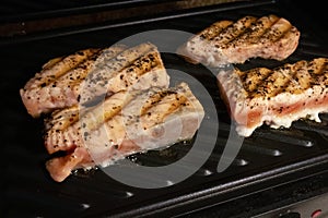 The process of frying salmon fillets at home