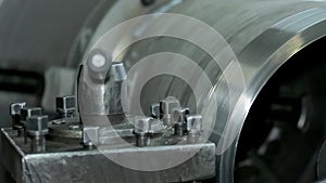 The process of grinding large metal cylindrical parts in production