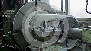 The process of grinding large metal cylindrical parts in production
