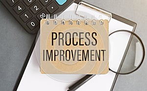 Process improvement. text on white paper