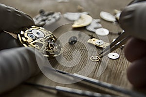 Process of installing a part on a mechanical watch, watch repair