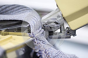 The process of joining parts on a special machine knitted production