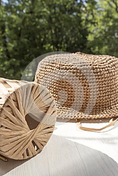 The process of knitting a raffia hat,