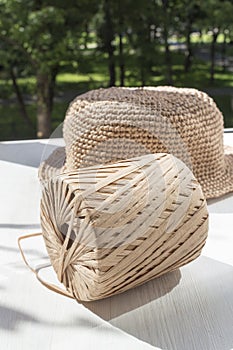 The process of knitting a raffia hat,