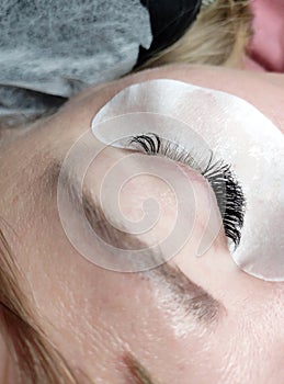 Process of Lash extensions macro eye top view