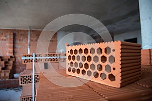The process of laying bricks on construction site