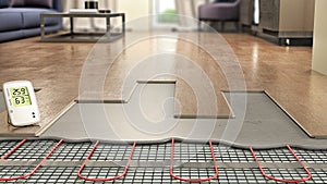 Process of laying laminate panels on floor with underfloor heating