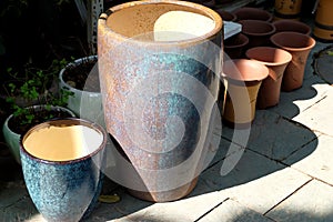 Porcelain pots in rows photo