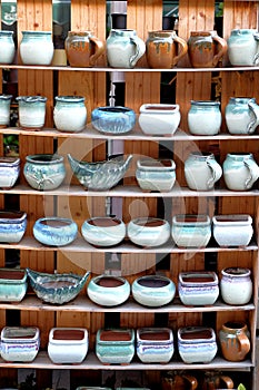 Porcelain pots in rows photo