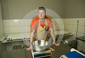 The process of making bread. The chef prepared for the hand kneading process