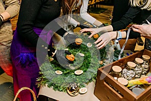 Process making Christmas wreath pine needles gluing