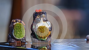 process of making clay plant pots in the shape of animals