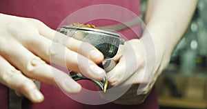 Process of making espresso in a coffee machine. Barista male hands making coffee in cafe