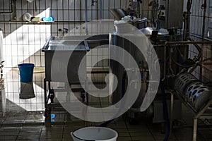 Process of making fresh white soft ricotta whey cheese on small cheese farm in Parma, Italy