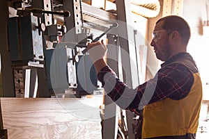 Process of making furniture with help of manual press