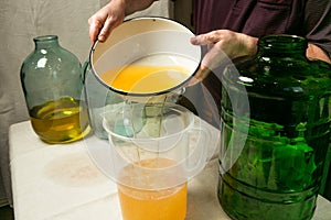 The process of making limoncello lemon liqueur at home.