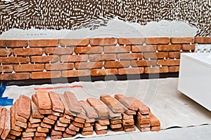 Process of making a red brick wall, home renovation