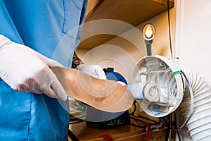 The process of manufacturing orthopedic individual insoles for people with leg diseases, flat feet. Close-up of a man`s hand of a